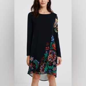 Navy blue dress with colorful flowers and shapes
